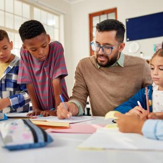 picture of teacher with students