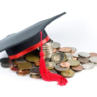 picture of graduation cap with coins spilling out from underneath