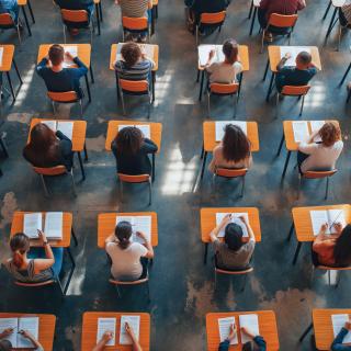 overhead view of students taking test