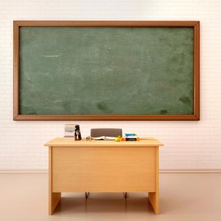 picture of empty desk in classroom