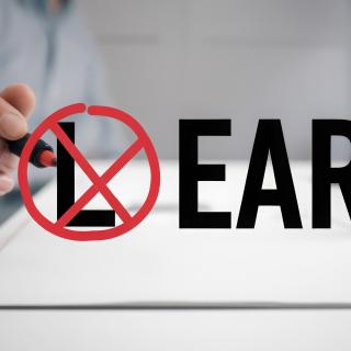 the word "learn" with the "L" circled and crossed out